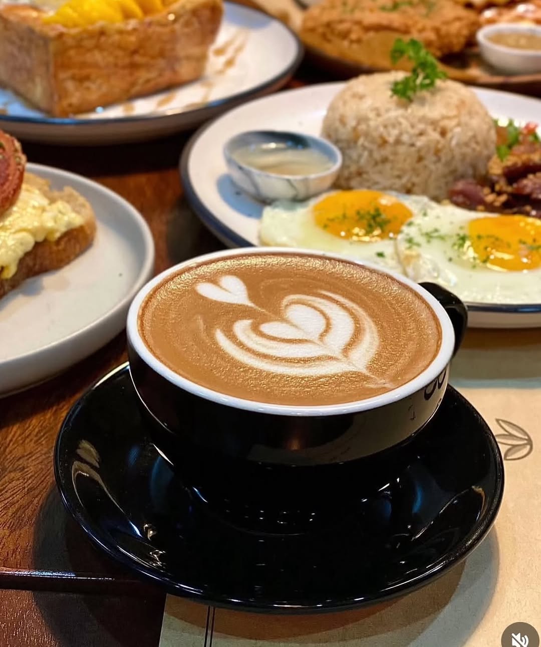 The Coze Café — latte art with a full brunch spread
